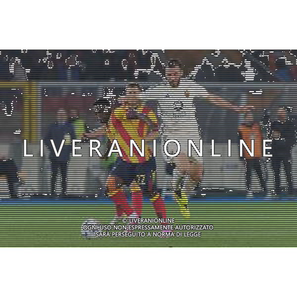 TVEM Lameck Banda of US Lecce in action against Bryan Cristante of AS Roma during the Italian soccer Serie A match US Lecce vs AS Roma on April 1, 2024 at Via del Mare Stadium in Lecce, Italy. Photo Emmanuele Mastrodonato/agenzia Liverani