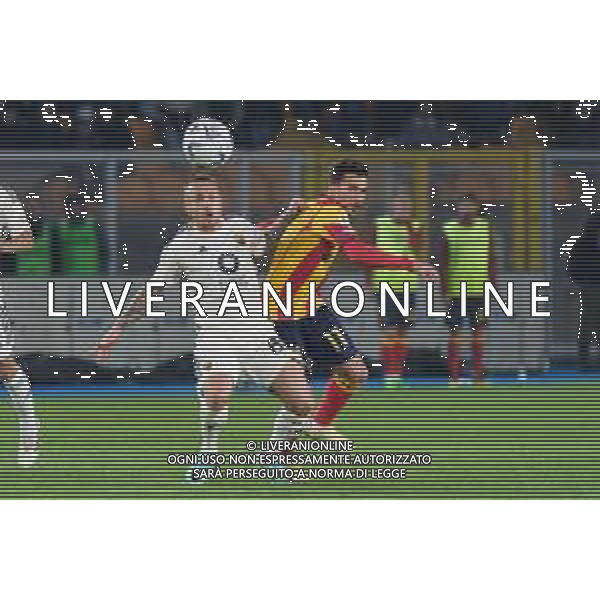 TVEM José Ángel Esmorís Tasende Angelino of AS Roma in action against Nicola Sansone of US Lecce during the Italian soccer Serie A match US Lecce vs AS Roma on April 1, 2024 at Via del Mare Stadium in Lecce, Italy. Photo Emmanuele Mastrodonato/agenzia Liverani