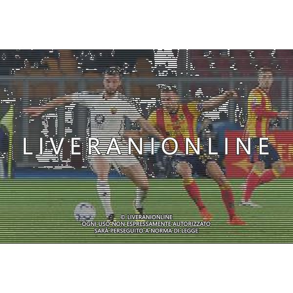 TVEM Bryan Cristante of AS Roma in action against Alexis Blin of US Lecce during the Italian soccer Serie A match US Lecce vs AS Roma on April 1, 2024 at Via del Mare Stadium in Lecce, Italy. Photo Emmanuele Mastrodonato/agenzia Liverani