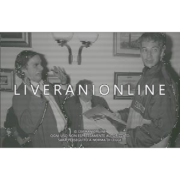 NEG-RETROSPETTIVA ROBERTO VECCHIONI CANTANTE NELLA FOTO ROBERTO VECCHIONI CON PAOLO STRINGARA NELL\'ANNO 1990-1991 AD APPIANO GENTILE IN VISITA AL RITIRO INTER AG ALDO LIVERANI SAS   