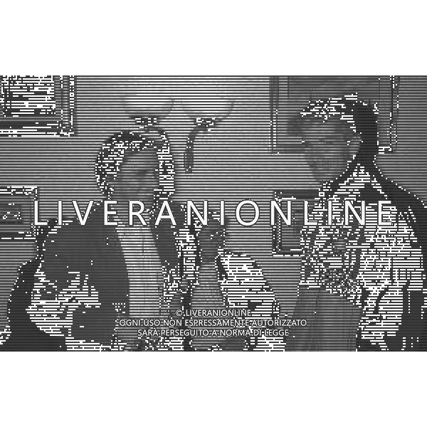 NEG-RETROSPETTIVA ROBERTO VECCHIONI CANTANTE NELLA FOTO ROBERTO VECCHIONI CON PAOLO STRINGARA NELL\'ANNO 1990-1991 AD APPIANO GENTILE IN VISITA AL RITIRO INTER AG ALDO LIVERANI SAS  