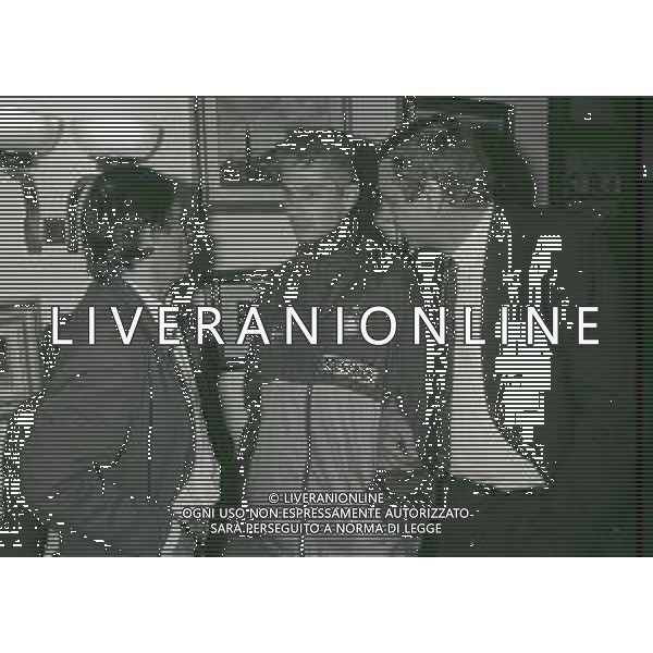 NEG-RETROSPETTIVA ROBERTO VECCHIONI CANTANTE NELLA FOTO ROBERTO VECCHIONI CON PAOLO STRINGARA E VALBERTO MILIANI NELL\'ANNO 1990-1991 AD APPIANO GENTILE IN VISITA AL RITIRO INTER AG ALDO LIVERANI SAS     