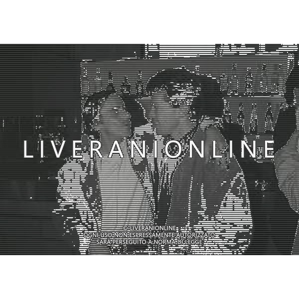 NEG-RETROSPETTIVA ROBERTO VECCHIONI CANTANTE NELLA FOTO ROBERTO VECCHIONI CON LOTHAR MATTHAUS NELL\'ANNO 1990-1991 AD APPIANO GENTILE IN VISITA AL RITIRO INTER AG ALDO LIVERANI SAS  