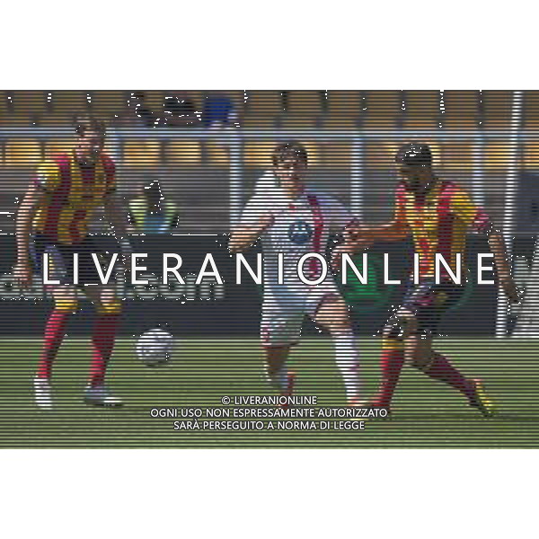 TVEM Lorenzo Colombo of AC Monza in action against Hamza Rafia of US Lecce during the Italian soccer Serie A match US Lecce vs Monza on April 27, 2024 at Via del Mare Stadium in Lecce, Italy. Photo Emmanuele Mastrodonato/agenzia Liverani