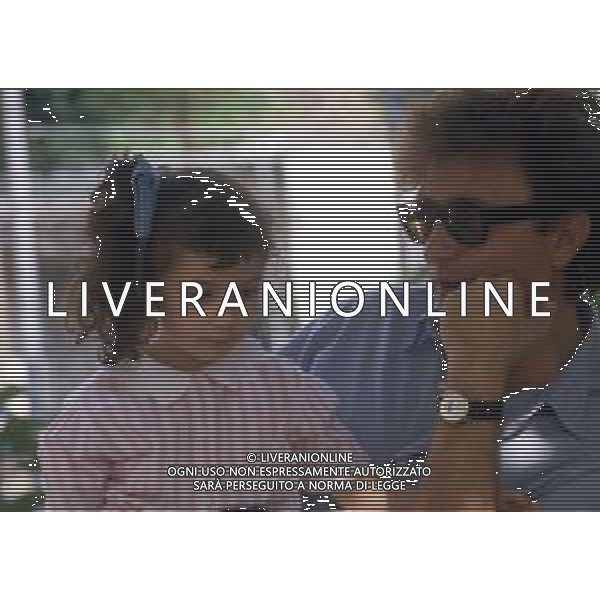 DIAP-RETROSPETTIVA RED RONNIE PSEUDONIMO GABRIELE ANSALONI-CRITICO MUSICALE GIORNATISTA PRESENTATORE TELEVISIVO E CONDUTTORE RADIOFONICO NELLA FOTO RED RONNIE CON LA FIGLIA JESSICA NELL\'ANNO 1986 AG ALDO LIVERANI SAS