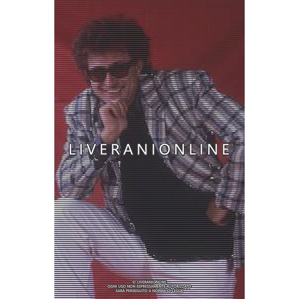 DIAP-RETROSPETTIVA RED RONNIE PSEUDONIMO GABRIELE ANSALONI-CRITICO MUSICALE GIORNATISTA PRESENTATORE TELEVISIVO E CONDUTTORE RADIOFONICO NELLA FOTO RED RONNIE NELL\'ANNO 1989 AG ALDO LIVERANI SAS  