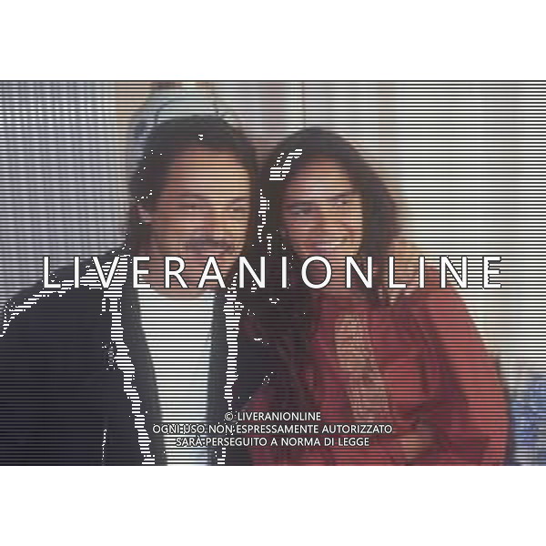 DIAP-RETROSPETTIVA TOQUINHO PSEUDONIMO ANTONIO PECCI FILHO CANTANTE-CHITARRISTA E CANTAUTORE BRASILIANO NELLA FOTO TOQUINHO NELL\'ANNO 1990 A SANREMO CON LA COMPAGNA MONICA AG ALDO LIVERANI SAS  