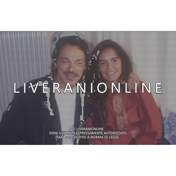 DIAP-RETROSPETTIVA TOQUINHO PSEUDONIMO ANTONIO PECCI FILHO CANTANTE-CHITARRISTA E CANTAUTORE BRASILIANO NELLA FOTO TOQUINHO NELL\'ANNO 1990 A SANREMO CON LA COMPAGNA MONICA AG ALDO LIVERANI SAS  