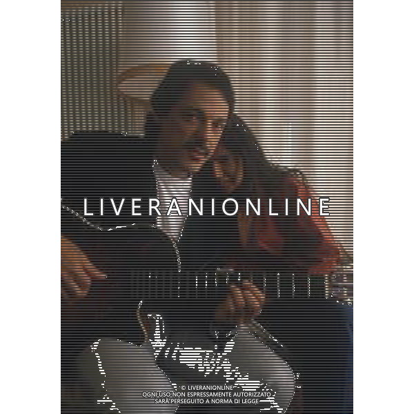 DIAP-RETROSPETTIVA TOQUINHO PSEUDONIMO ANTONIO PECCI FILHO CANTANTE-CHITARRISTA E CANTAUTORE BRASILIANO NELLA FOTO TOQUINHO NELL\'ANNO 1990 A SANREMO CON LA COMPAGNA MONICA AG ALDO LIVERANI SAS  