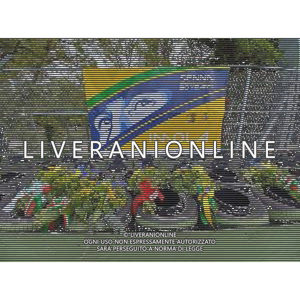 IMOLA 01 05 2024 AUTODROMO ENZO E DINO FERRARI 30∞ANNIVERSARIO DELLA MORTE DI AYRTON SENNA PILOTA FORMULA 1 NELLA FOTO I FIORI SUL POSTO DELL\'INCIDENTE ©SANNA / AGENZIA ALDO LIVERANI SAS