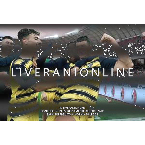 TVEM Woyo Coulibaly, Yordan Osorio and Enrico Delprato of Parma Calcio are celebrating their mathematical promotion to Serie A at the end of the Serie B match on the SSC Bari field in Bari, Italy, on May 1, 2024. Photo by Emmanuele Mastrodonato/agenzia Aldo Liverani sas / AGENZIA ALDO LIVERANI SAS