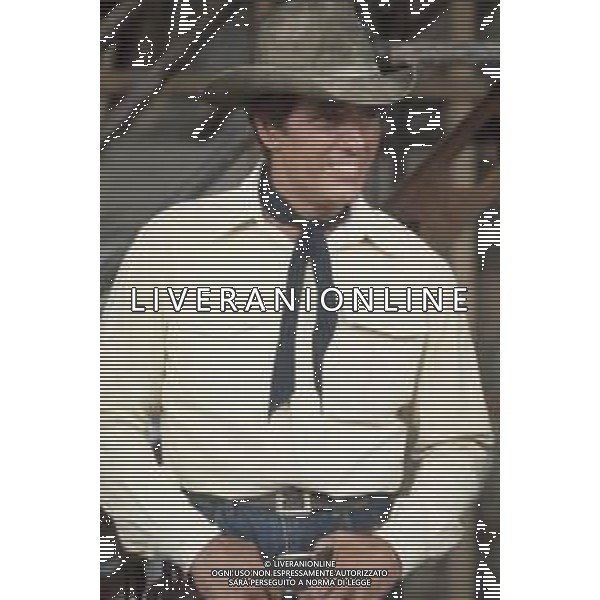 DIAP-RETROSPETTIVA GIULIANO GEMMA ATTORE NELLA FOTO GIULIANO GEMMA SUL SET DEL FILM “TEX“ A ROMA NELL\'ANNO 1985 AG ALDO LIVERANI SAS 