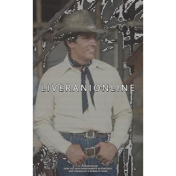 DIAP-RETROSPETTIVA GIULIANO GEMMA ATTORE NELLA FOTO GIULIANO GEMMA SUL SET DEL FILM “TEX“ A ROMA NELL\'ANNO 1985 AG ALDO LIVERANI SAS 