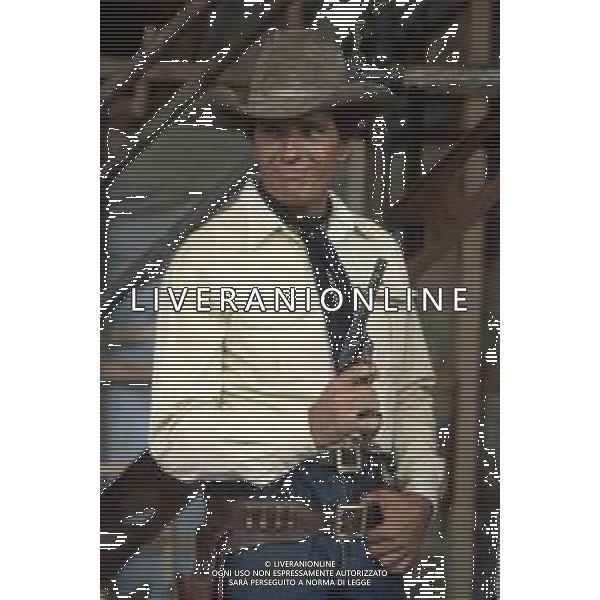 DIAP-RETROSPETTIVA GIULIANO GEMMA ATTORE NELLA FOTO GIULIANO GEMMA SUL SET DEL FILM “TEX“ A ROMA NELL\'ANNO 1985 AG ALDO LIVERANI SAS 