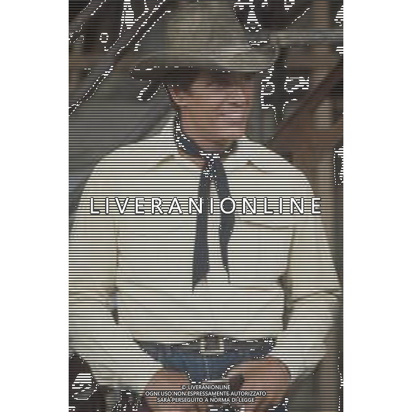 DIAP-RETROSPETTIVA GIULIANO GEMMA ATTORE NELLA FOTO GIULIANO GEMMA SUL SET DEL FILM “TEX“ A ROMA NELL\'ANNO 1985 AG ALDO LIVERANI SAS 