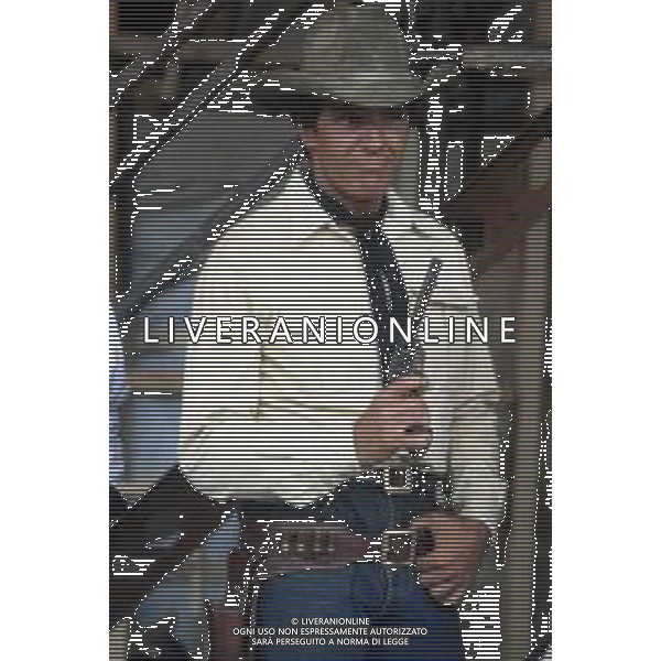DIAP-RETROSPETTIVA GIULIANO GEMMA ATTORE NELLA FOTO GIULIANO GEMMA SUL SET DEL FILM “TEX“ A ROMA NELL\'ANNO 1985 AG ALDO LIVERANI SAS 