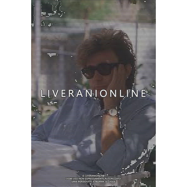 DIAP-RETROSPETTIVA RED RONNIE PSEUDONIMO GABRIELE ANSALONI-CRITICO MUSICALE GIORNATISTA PRESENTATORE TELEVISIVO E CONDUTTORE RADIOFONICO NELLA FOTO RED RONNIE  AG ALDO LIVERANI SAS 