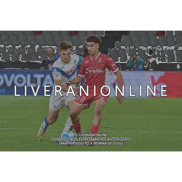 TVEM Ismail Achik of SSC Bari in action against Matthieu Huard of Brescia Calcio during the Italian Serie BKT match between SSC Bari vs Brescia Calcio on 10 May 2024 at the San Nicola stadium in Bari, Italy. Photo by Emmanuele Mastrodonato/ag. Aldo Liverani sas/ AGENZIA ALDO LIVERANI SAS