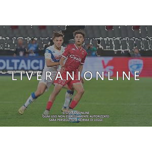 TVEM Ismail Achik of SSC Bari in action against Matthieu Huard of Brescia Calcio during the Italian Serie BKT match between SSC Bari vs Brescia Calcio on 10 May 2024 at the San Nicola stadium in Bari, Italy. Photo by Emmanuele Mastrodonato/ag. Aldo Liverani sas/ AGENZIA ALDO LIVERANI SAS