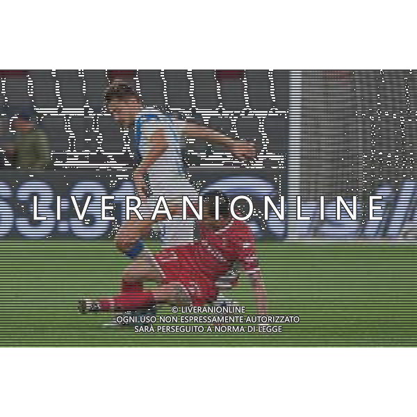 TVEM Raffaele Maiello of SSC Bari in action against Matthieu Huard of Brescia Calcio during the Italian Serie BKT match between SSC Bari vs Brescia Calcio on 10 May 2024 at the San Nicola stadium in Bari, Italy. Photo by Emmanuele Mastrodonato/ag. Aldo Liverani sas/ AGENZIA ALDO LIVERANI SAS