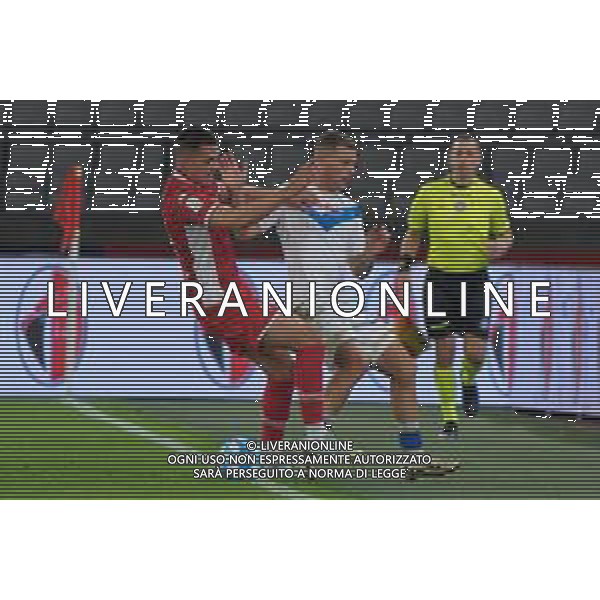 TVEM Michele Besaggio of Brescia Calcio in action against Karlo Lulic of SSC Bari during the Italian Serie BKT match between SSC Bari vs Brescia Calcio on 10 May 2024 at the San Nicola stadium in Bari, Italy. Photo by Emmanuele Mastrodonato/ag. Aldo Liverani sas/ AGENZIA ALDO LIVERANI SAS