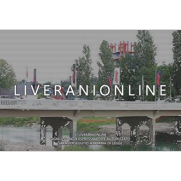 IMOLA 13 05 2024 (LUNEDI) AUTODROMO ENZO E DINO FERRARI PREPARATIVI PER IL GRAN PREMIO DI FORMULA 1 NELLA FOTO PONTE DEL VIALE DANTE BANDIERE DIETRO LA TORRE DELL\'AUTODROMO ©SANNA/AGENZIA ALDO LIVERANI SAS