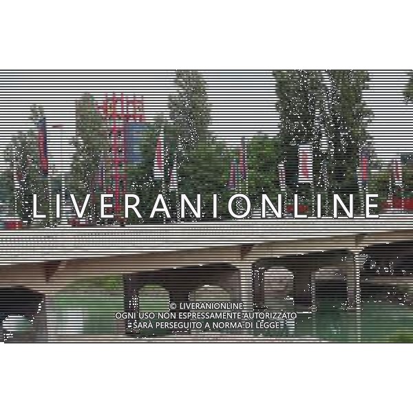 IMOLA 13 05 2024 (LUNEDI) AUTODROMO ENZO E DINO FERRARI PREPARATIVI PER IL GRAN PREMIO DI FORMULA 1 NELLA FOTO PONTE DEL VIALE DANTE BANDIERE DIETRO LA TORRE DELL\'AUTODROMO ©SANNA/AGENZIA ALDO LIVERANI SAS