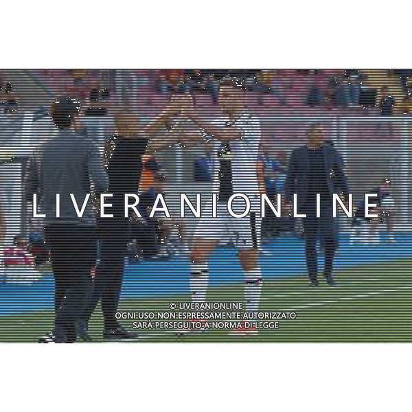 TVEM Lorenzo Lucca of Udinese Calcio celebrates after scoring a goal with coach Fabio Cannavaro of Udinese Calcio during the Italian soccer Serie A match US Lecce vs Udinese on May 13, 2024 at Via del Mare Stadium in Lecce, Italy. Photo Emmanuele Mastrodonato/agenzia Liverani/AGENZIA ALDO LIVERANI SAS