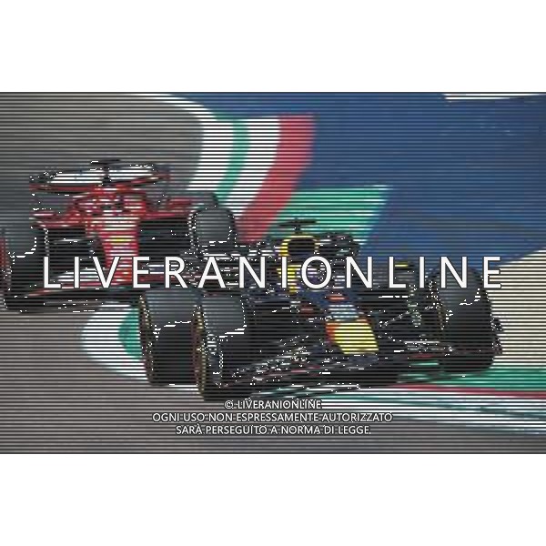 IMOLA 18 05 2024 AUTODROMO ENZO E DINO FERRARI (SABATO) GRAN PREMIO DI FORMULA 1 NELLA FOTO MAX VERSTAPPEN RED BULL E CHARLES LECLERC FERRARI ALLA CURVA ACQUE MINERALI ©SANNA / AGENZIA ALDO LIVERANI SAS