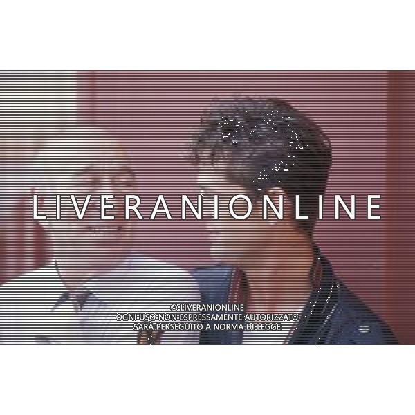 DIAP-RETROSPETTIVA GIULIANO MONTALDO REGISTA NELLA FOTO GIULIANO MONTALDO CON RUPERT EVERETT CAST DEL FILM“GLI OCCHIALI D\'ORO“ ANNO 1987 A VENEZIA FOTO DAVIDE MANDRINI-AG ALDO LIVERANI SAS