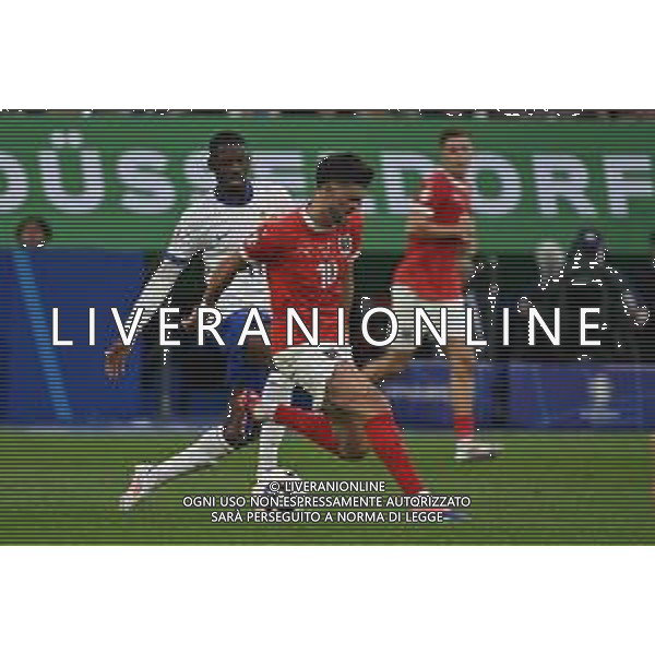 Austria vs Francia - UEFA EURO 2024 nella foto Florian Grillitsch (Austria) e dietro Ousmane Dembelè (Francia) Dusseldorf (GER) 17-06-2024 Dusseldorf Arena Campionato Europeo di Calcio - UEFA EURO 2024 fase a gironi - 1a giornata Gruppo D foto Roberto Garavaglia/Agenzia Aldo Liverani sas