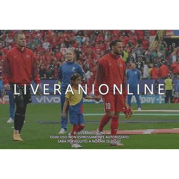 TVEM Hakan Calhanoglu of Turkey and Mert Günok of Turkey enter the field during the UEFA EURO 2024 group stage match between Turkey and Georgia at Westfalenstadion on June 18, 2024 in Dortmund, Germany. Photo by Emmanuele Mastrodonato/ag. Aldo Liverani sas/AGENZIA ALDO LIVERANI SAS