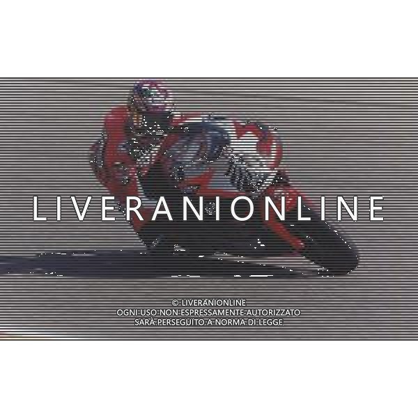 DIAP-RETROSPETTIVA TETSUYA HARADA MOTOCICLISMO NELLA FOTO TETSUYA HARADA NELL\'ANNO 2000 CON MOTO APRILIA 500 AG CONTROLUCE-AG ALDO LIVERANI SAS 