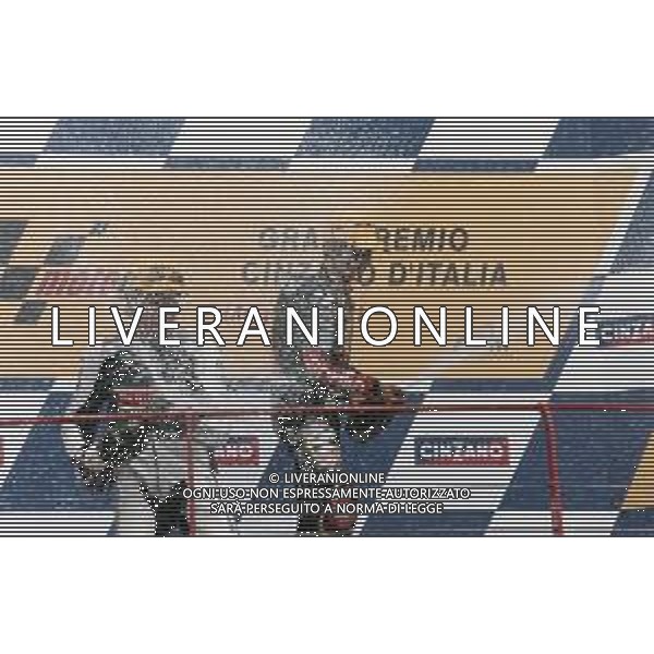 DIAP-RETROSPETTIVA TETSUYA HARADA MOTOCICLISMO NELLA FOTO TETSUYA HARADA NELL\'ANNO 2001 CON ROLFO E MARCO MELANDRI  AG CONTROLUCE-AG ALDO LIVERANI SAS