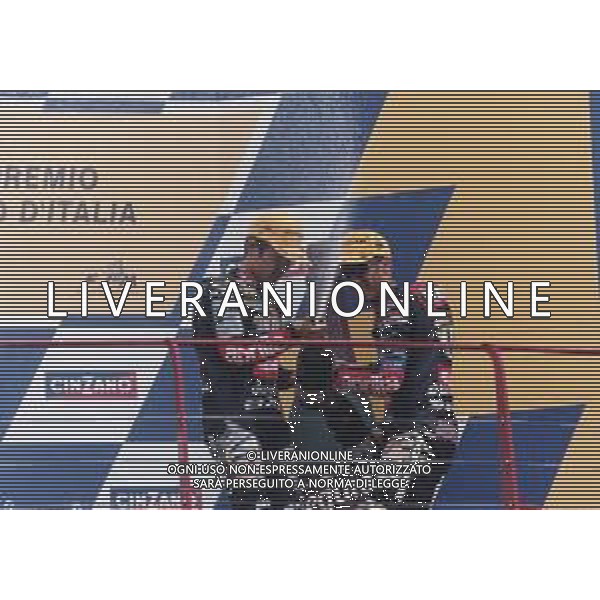 DIAP-RETROSPETTIVA TETSUYA HARADA MOTOCICLISMO NELLA FOTO TETSUYA HARADA NELL\'ANNO 2001 CON ROLFO E MARCO MELANDRI  AG CONTROLUCE-AG ALDO LIVERANI SAS
