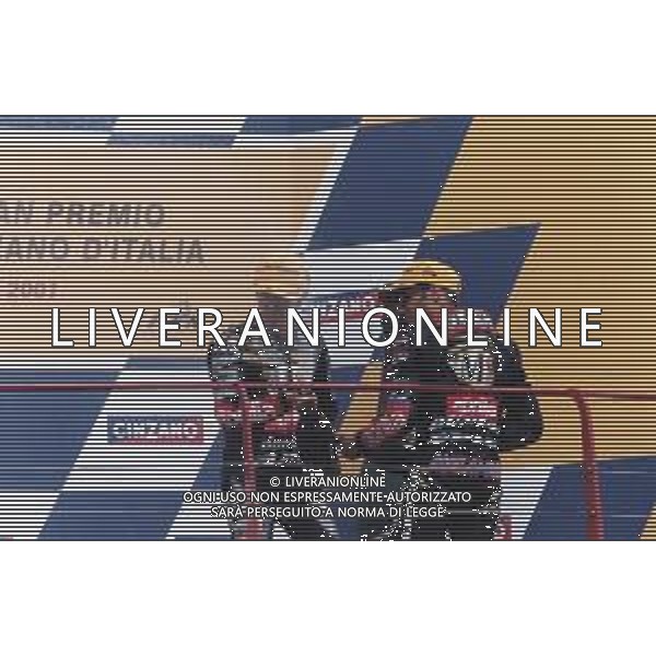 DIAP-RETROSPETTIVA TETSUYA HARADA MOTOCICLISMO NELLA FOTO TETSUYA HARADA NELL\'ANNO 2001 CON ROLFO E MARCO MELANDRI  AG CONTROLUCE-AG ALDO LIVERANI SAS