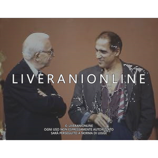DIAP-RETROSPETTIVA ADRIANO CELENTANO ATTORE CANTANTE  NELLA FOTO ADRIANO CELENTANO NELL\'ANNO 1991 NELLA TRASMISSIONE TELEVISIVA “NOTTE ROCK“ CON ENZO BIAGI  AG ALDO LIVERANI SAS  