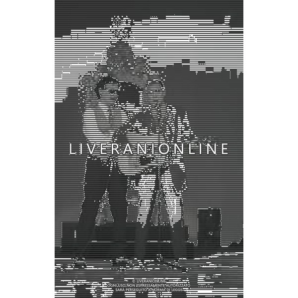 NEG-RETROSPETTIVA ADRIANO CELENTANO ATTORE CANTANTE  NELLA FOTO ADRIANO CELENTANO NELL\'ANNO 1991 NELLA TRASMISSIONE TELEVISIVA “NOTTE ROCK“  AG ALDO LIVERANI SAS 