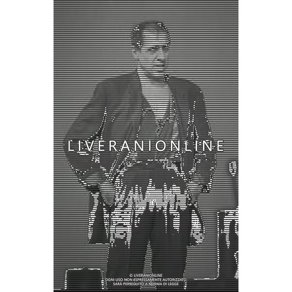 NEG-RETROSPETTIVA ADRIANO CELENTANO ATTORE CANTANTE  NELLA FOTO ADRIANO CELENTANO NELL\'ANNO 1991 NELLA TRASMISSIONE TELEVISIVA “NOTTE ROCK“  AG ALDO LIVERANI SAS 