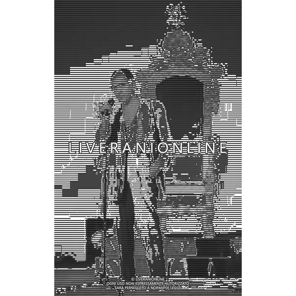 NEG-RETROSPETTIVA ADRIANO CELENTANO ATTORE CANTANTE  NELLA FOTO ADRIANO CELENTANO NELL\'ANNO 1991 NELLA TRASMISSIONE TELEVISIVA “NOTTE ROCK“  AG ALDO LIVERANI SAS 