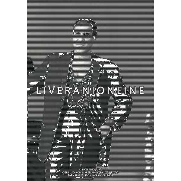 NEG-RETROSPETTIVA ADRIANO CELENTANO ATTORE CANTANTE  NELLA FOTO ADRIANO CELENTANO NELL\'ANNO 1991 NELLA TRASMISSIONE TELEVISIVA “NOTTE ROCK“  AG ALDO LIVERANI SAS 