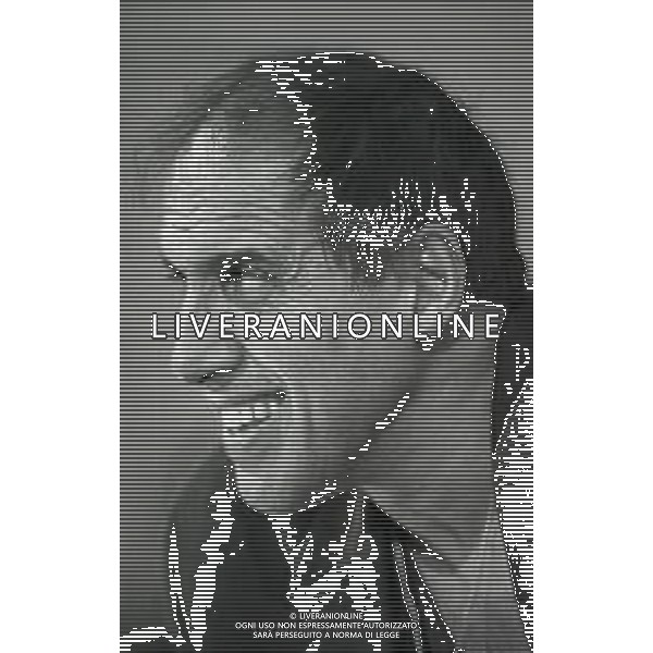 NEG-RETROSPETTIVA ADRIANO CELENTANO ATTORE CANTANTE  NELLA FOTO ADRIANO CELENTANO NELL\'ANNO 1991 NELLA TRASMISSIONE TELEVISIVA “NOTTE ROCK“  AG ALDO LIVERANI SAS 