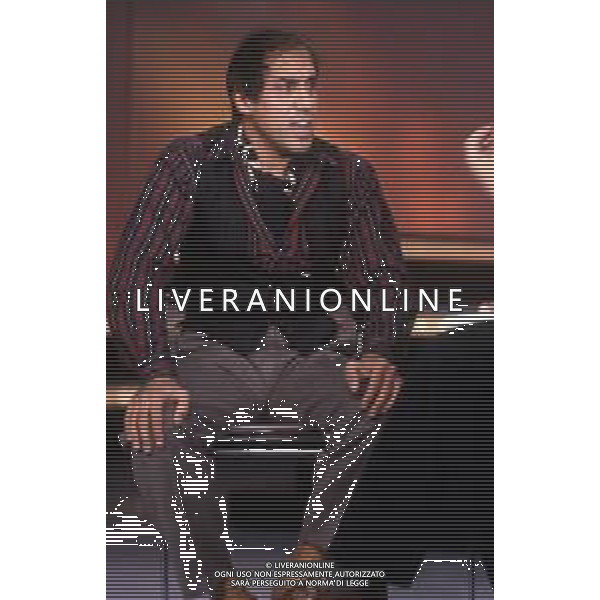 DIAP-RETROSPETTIVA ADRIANO CELENTANO ATTORE CANTANTE  NELLA FOTO ADRIANO CELENTANO NELL\'ANNO 1991 NELLA TRASMISSIONE TELEVISIVA “NOTTE ROCK“  AG ALDO LIVERANI SAS 