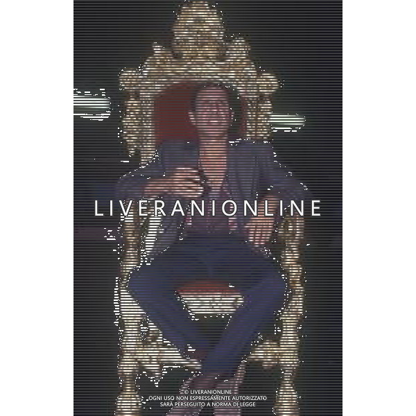 DIAP-RETROSPETTIVA ADRIANO CELENTANO ATTORE CANTANTE  NELLA FOTO ADRIANO CELENTANO NELL\'ANNO 1991 NELLA TRASMISSIONE TELEVISIVA “NOTTE ROCK“  AG ALDO LIVERANI SAS 