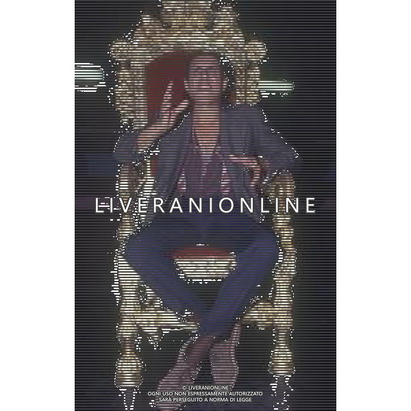 DIAP-RETROSPETTIVA ADRIANO CELENTANO ATTORE CANTANTE  NELLA FOTO ADRIANO CELENTANO NELL\'ANNO 1991 NELLA TRASMISSIONE TELEVISIVA “NOTTE ROCK“  AG ALDO LIVERANI SAS 