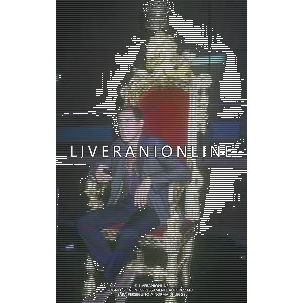 DIAP-RETROSPETTIVA ADRIANO CELENTANO ATTORE CANTANTE IVA ADRIANO CELENTANO ATTORE CANTANTE  NELLA FOTO ADRIANO CELENTANO NELL\'ANNO 1991 NELLA TRASMISSIONE TELEVISIVA “NOTTE ROCK“  AG ALDO LIVERANI SAS 