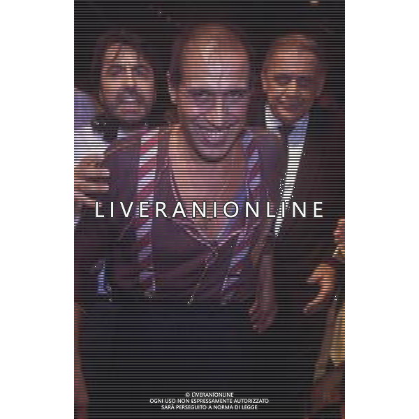 DIAP-RETROSPETTIVA ADRIANO CELENTANO ATTORE CANTANTE  NELLA FOTO ADRIANO CELENTANO NELL\'ANNO 1991 NELLA TRASMISSIONE TELEVISIVA “NOTTE ROCK“  AG ALDO LIVERANI SAS 