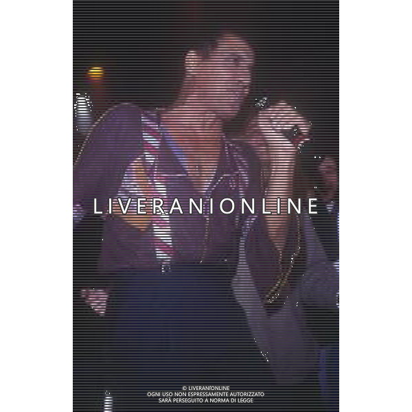 DIAP-RETROSPETTIVA ADRIANO CELENTANO ATTORE CANTANTE  NELLA FOTO ADRIANO CELENTANO NELL\'ANNO 1991 NELLA TRASMISSIONE TELEVISIVA “NOTTE ROCK“  AG ALDO LIVERANI SAS 