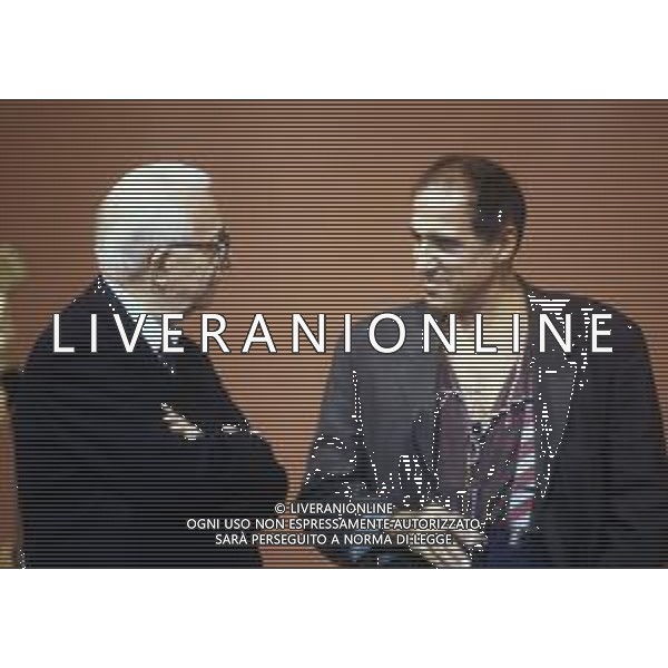 DIAP-RETROSPETTIVA ADRIANO CELENTANO ATTORE CANTANTE  NELLA FOTO ADRIANO CELENTANO NELL\'ANNO 1991 NELLA TRASMISSIONE TELEVISIVA “NOTTE ROCK“ CON ENZO BIAGI AG ALDO LIVERANI SAS 