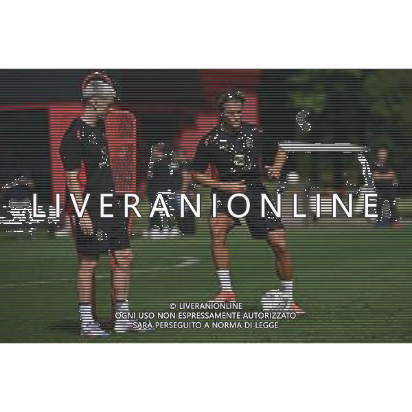 TVRG Primo allenamento Milan nella foto Alexis Saelemaekers e Lorenzo Colombo Carnago (VA) 08-07-2024 Primo allenamento del Milan presso il centro sportivo Milanello in preparazione della stagione 2024-2025 foto Roberto Garavaglia/Agenzia Aldo Liverani sas